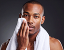 A man toweling off post shave.