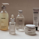 Comune products on a counter.