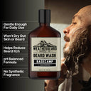 Weatherbeard Supply Co. Basecamp Beard Wash bottle shown prominently in the center, with marketing text on the left and a man shaving on the right.