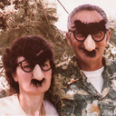 Our namesake John with his wife Beverly in Graucho Marx glasses.