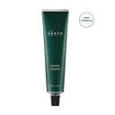 Green tube of Heath Shave Cream on a white background